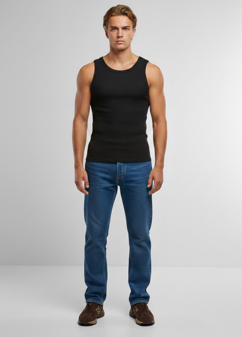 Model is wearing a size Large (L). Premium black men's tank top base for custom embroidery.